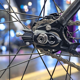 ARDENTLY Rocket CNC Chain Tensioner installed on rear wheel of fixed-gear bike.