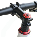 Close-up of a bicycle handlebar with red and black components on a white background - XFIXXI PREMIÈRE V3 O Canada Limited Edition