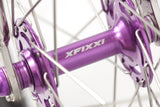 Close-up of the purple XFIXXI hub on the TrackloX TLX20 fixed gear | single speed bike, showcasing durable craftsmanship for urban riding, tracklocross, and bikepacking - by XFIXXI