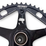 Close-up of INTRO 7 48T HollowTech crankset showing integrated bearing system