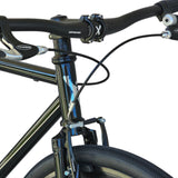 Cockpit view of the XFIXXI TrackloX featuring a riser handlebar, ergonomic grips and integrated bell brake levers.