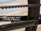 Rear drivetrain detail of the XFIXXI TrackloX showing the Gates Carbon Belt Drive and fixed gear rear sprocket.