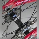 Rear hub, cog, and chain detail of XFIXXI Première V3 Carbon Limited Edition fixed gear bike