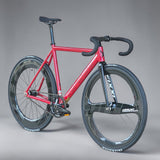 Angled view of XFIXXI Première V3 Carbon Limited Edition fixie bike in red