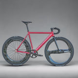 Studio photo of XFIXXI Première V3 Carbon Limited Edition fixed gear bike in red