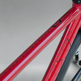 Top tube detail of XFIXXI Première V3 Carbon Limited Edition red bike