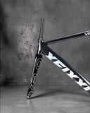 XFIXXI VELO Pursuit track frameset displayed in studio setting