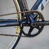 Close-up view of XFIXXI VÉLO VITE VITE Hollowtech CNC crankset and chainring in black