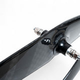 Close-up of XFIXXI VITE AERIUM² carbon front wheel hub and axle detail