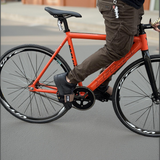 Rider using XFIXXI VITE Everyday Pedal Straps on a fixed gear bike